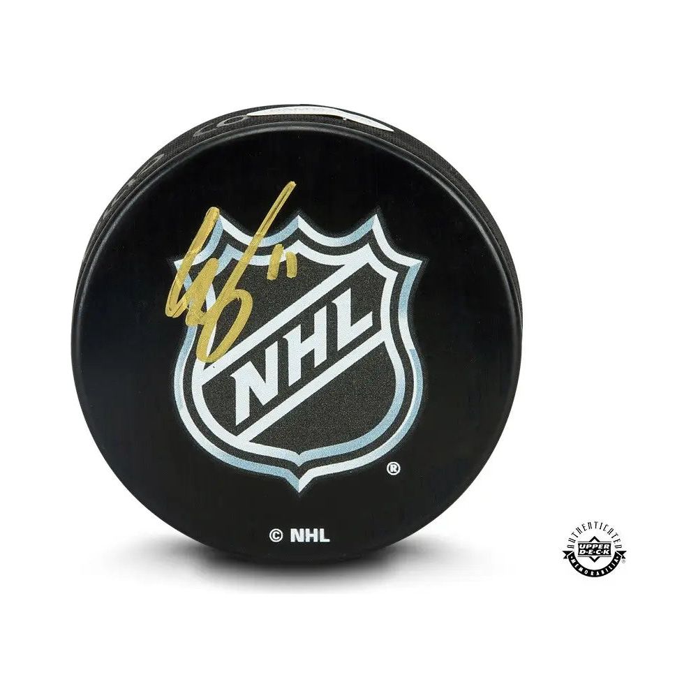 EELI TOLVANEN Autographed NHL Logo Rubber Puck UDA