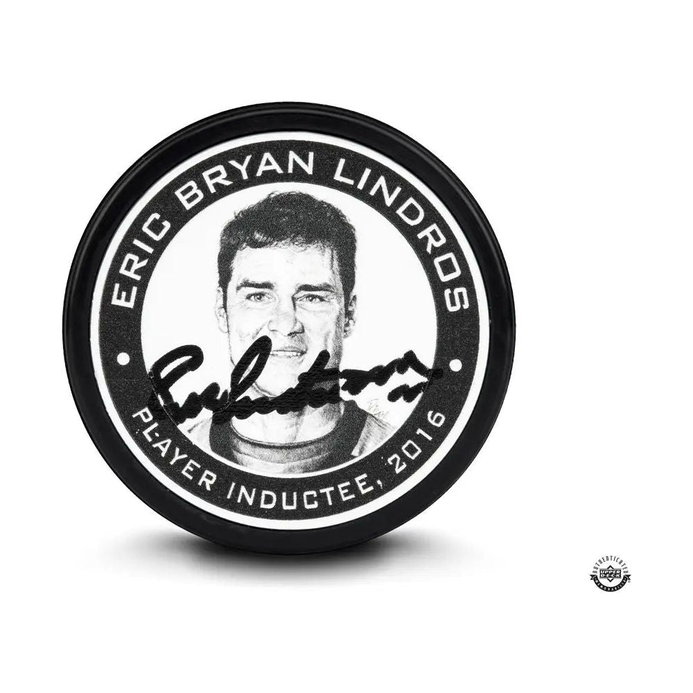 ERIC LINDROS Autographed “Hockey Hall of Fame” Puck UDA