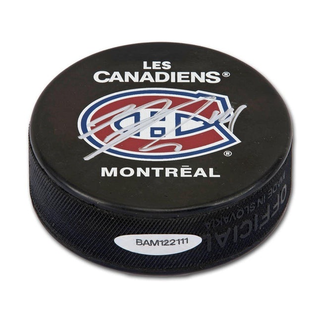 NICK SUZUKI Autographed Montreal Canadiens Hockey Puck UDA
